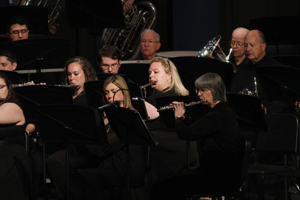 Flute section performing at Montgomery Community Band concert